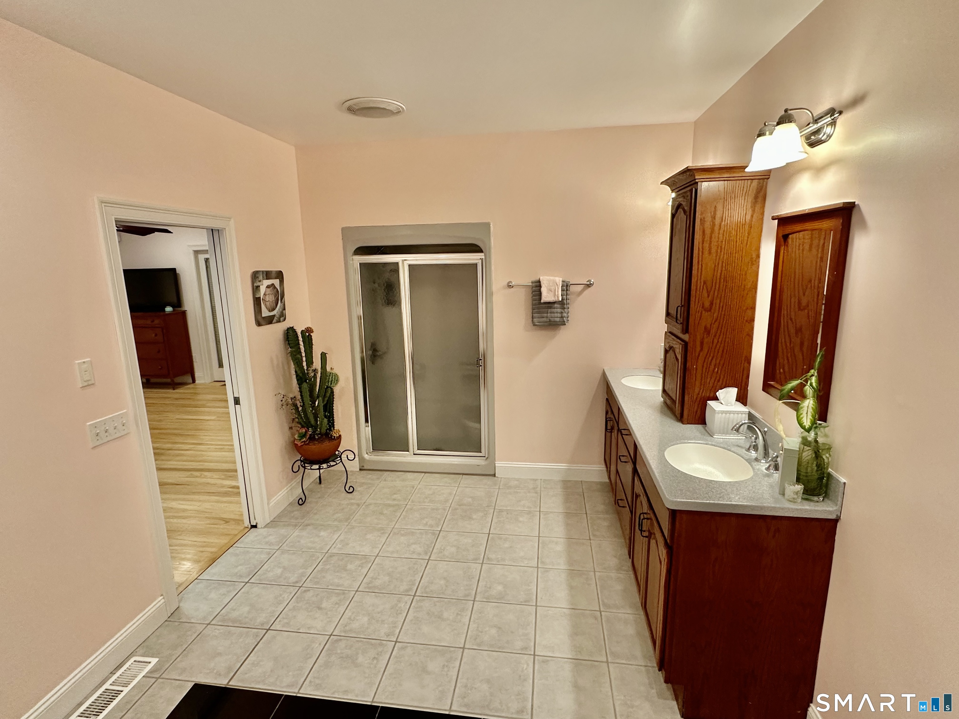 455 Chesterfield Road Montville, CT 06370 - Photo 14 of 40 a bathroom with a sink and mirror