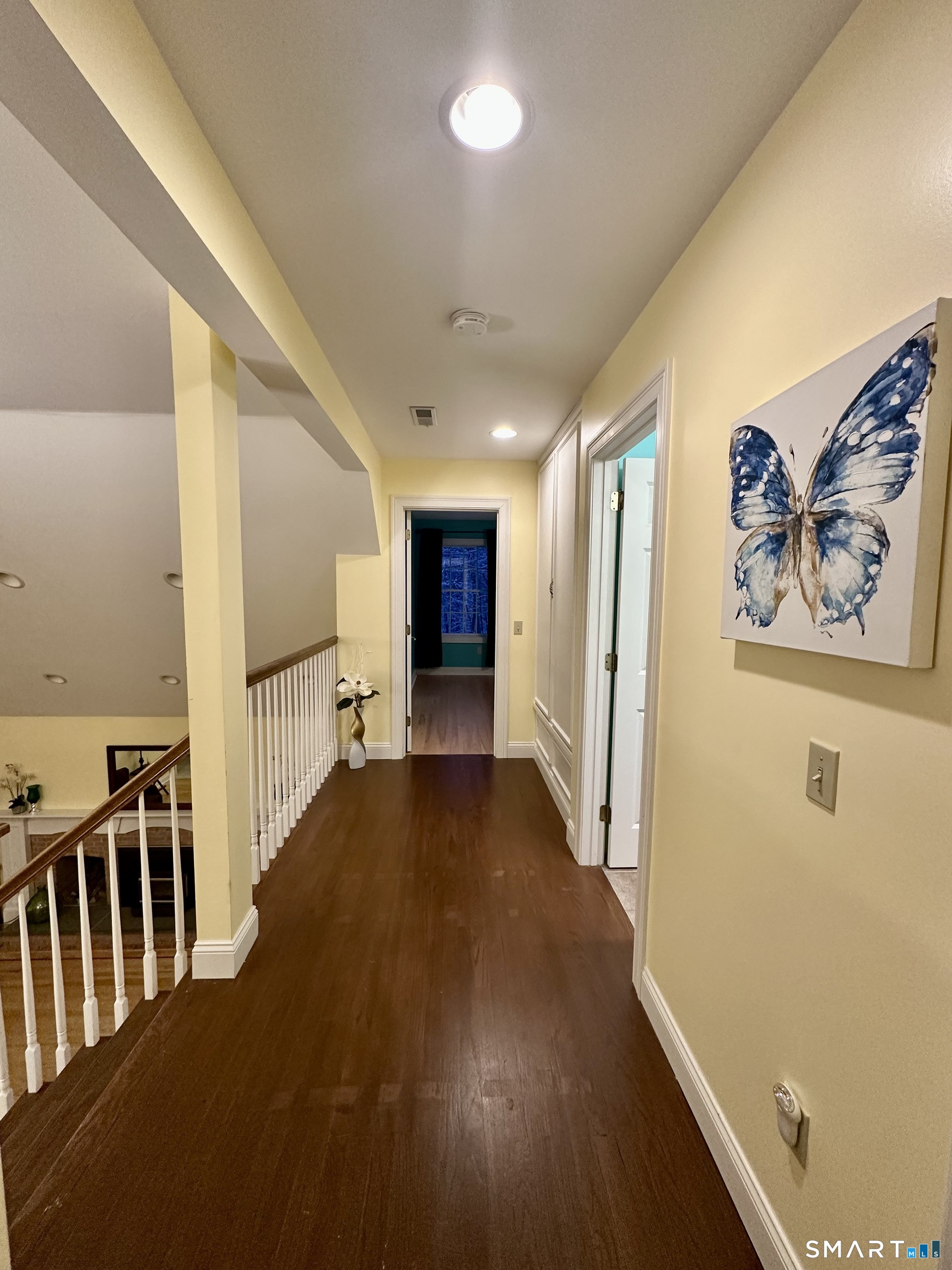 455 Chesterfield Road Montville, CT 06370 - Photo 20 of 40 a view of a hallway with wooden floor and staircase