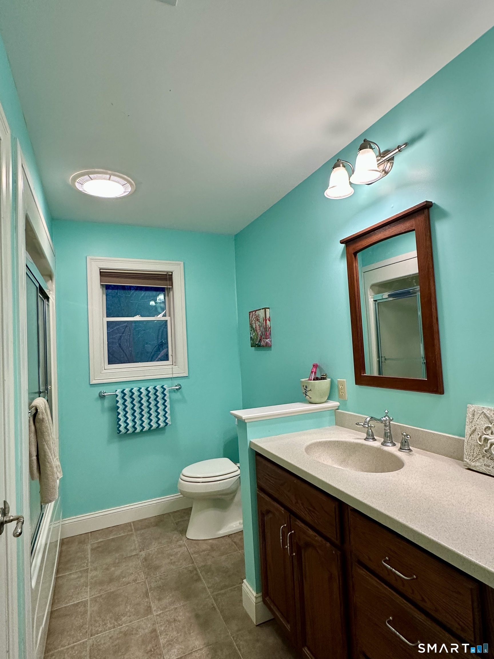 455 Chesterfield Road Montville, CT 06370 - Photo 23 of 40 a bathroom with a sink and a mirror