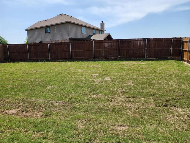 a view of a bathroom from a hallway