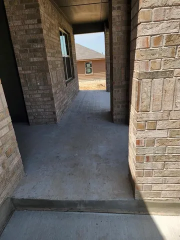 a house view with a garden space