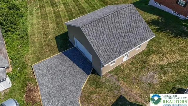 a view of backyard with green space