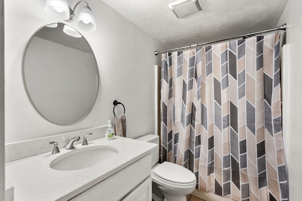 16 Monack Road Wareham, MA 02532 - Photo 17 of 24 a bathroom with a sink and a mirror