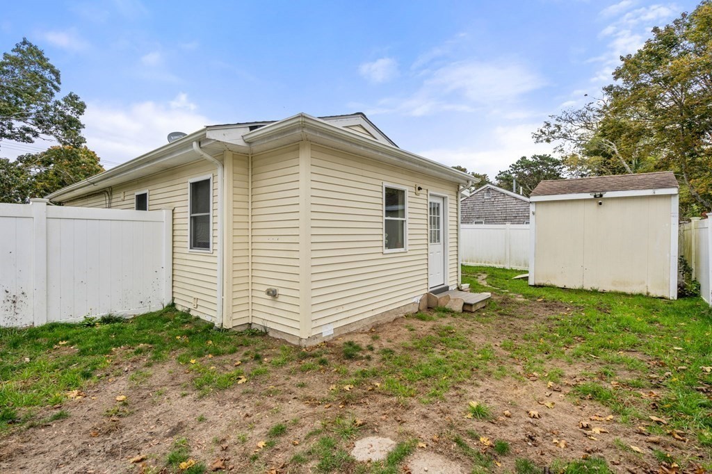 16 Monack Road Wareham, MA 02532 - Photo 21 of 24 a view of a backyard of the house