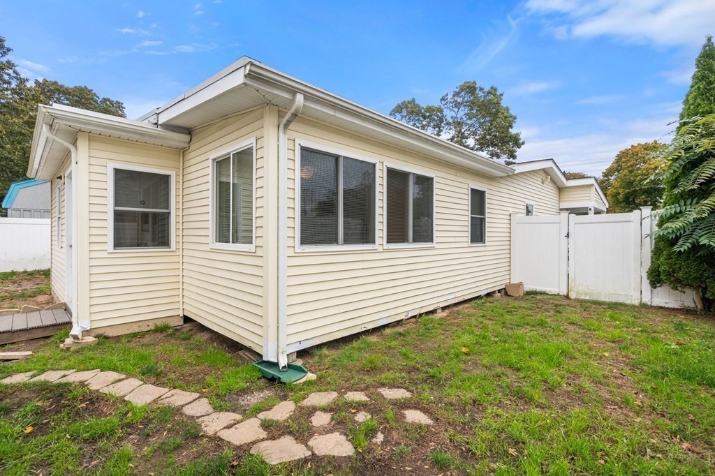 16 Monack Road Wareham, MA 02532 - Photo 22 of 24 a view of a house with a yard