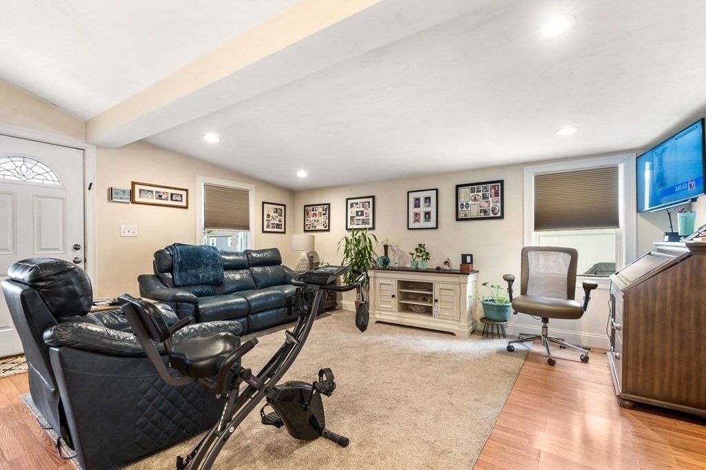 16 Monack Road Wareham, MA 02532 - Photo 4 of 24 a living room with furniture and a flat screen tv