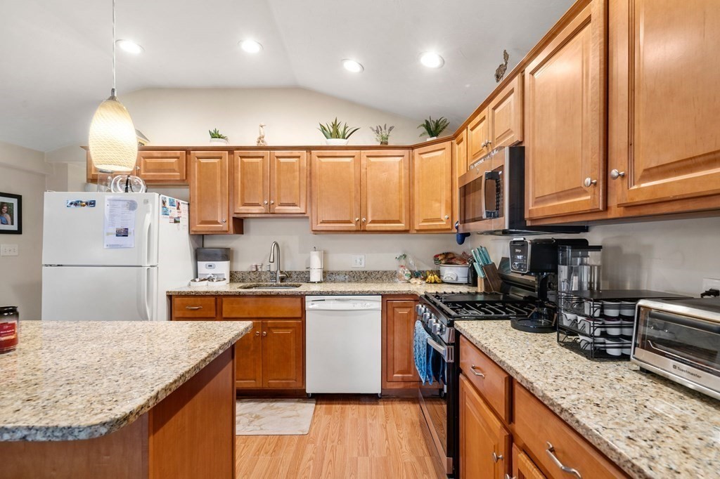 16 Monack Road Wareham, MA 02532 - Photo 7 of 24 a kitchen with stainless steel appliances granite countertop a sink stove and refrigerator