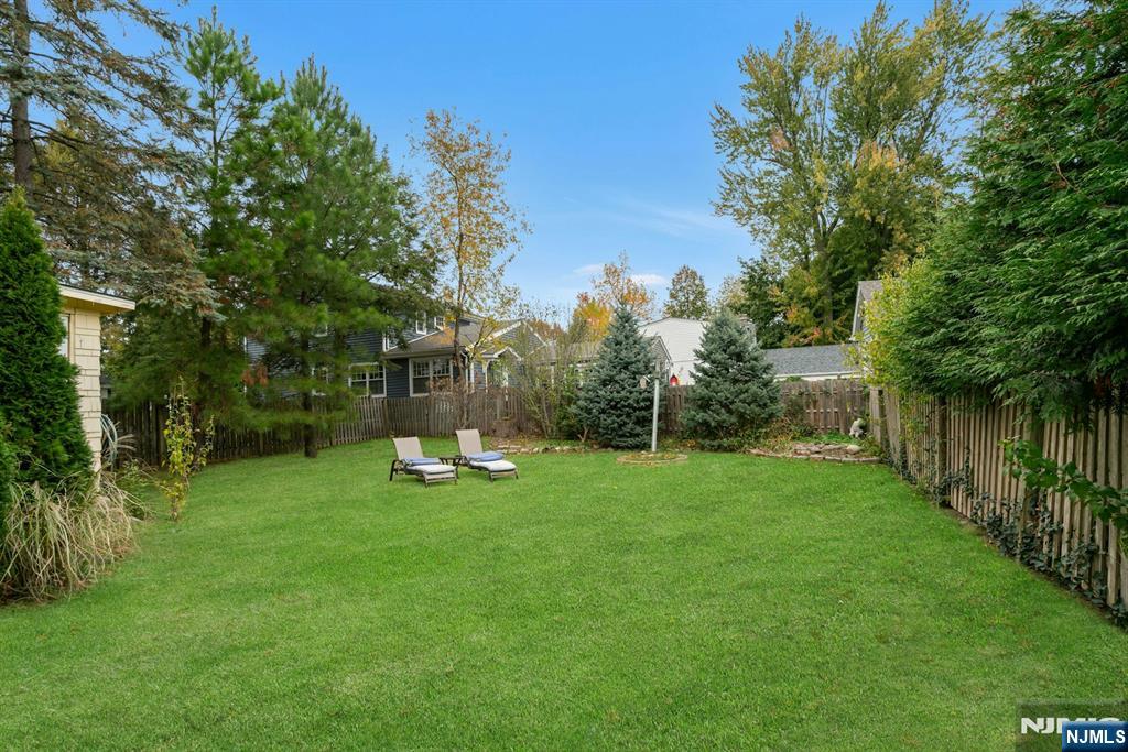 409 Warren Avenue Ho-Ho-Kus, NJ 07423 - Photo 21 of 23 a view of a park with large trees