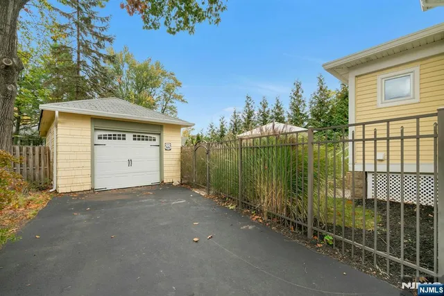 a view of a house with a garden