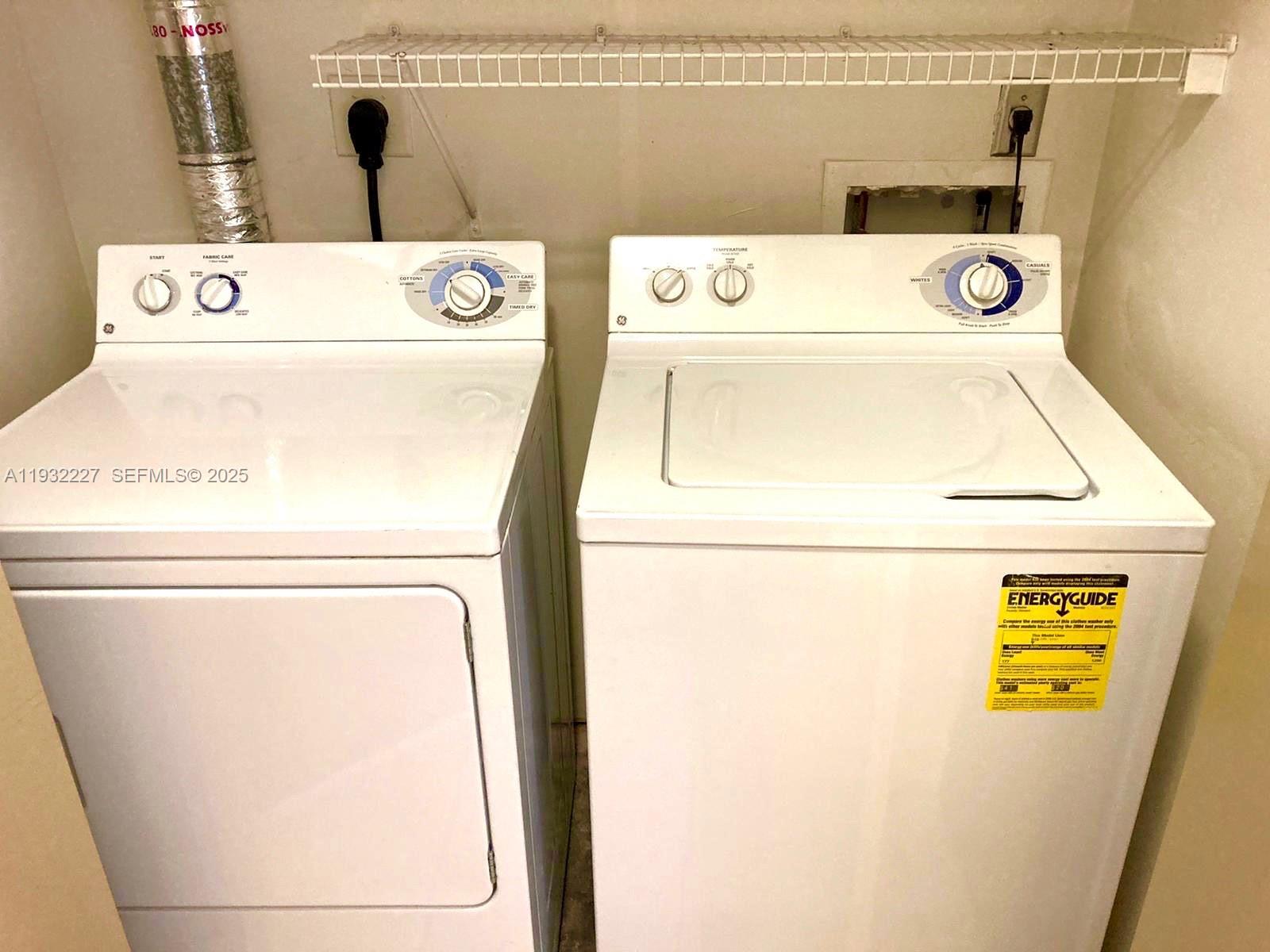 2001 Biscayne Boulevard, Unit 2608 Miami, FL 33137 - Photo 8 of 10 a utility room with dryer and washer