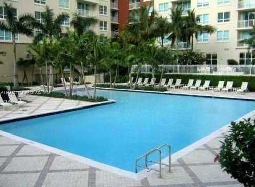 2001 Biscayne Boulevard, Unit 2608 Miami, FL 33137 - Photo 10 of 10 a view of a lake with a bench and chairs