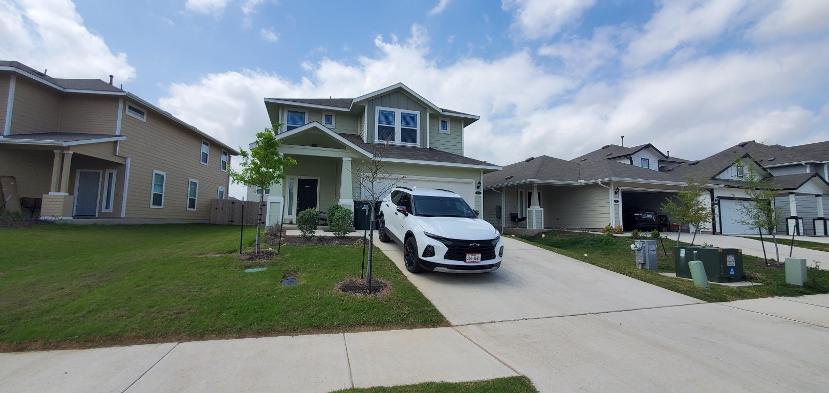 a house view with a garden space