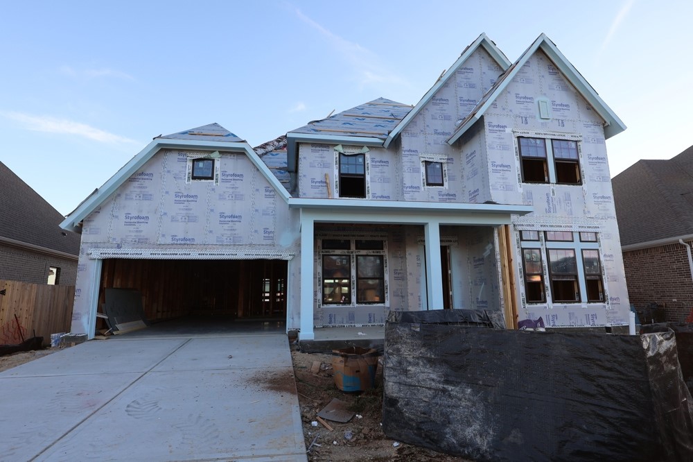 3308 Bentwood Ranch Drive Conroe, TX 77385 - Photo 9 of 24 a front view of a house with garage