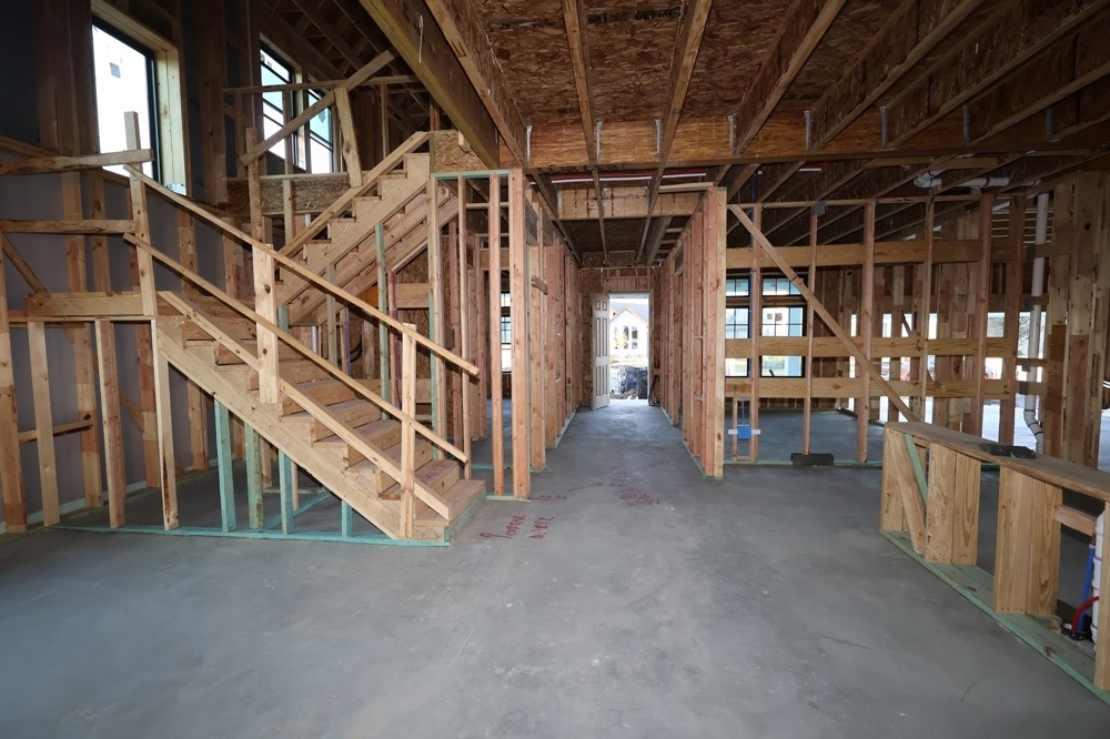 3308 Bentwood Ranch Drive Conroe, TX 77385 - Photo 13 of 24 a view of an empty room with stairs