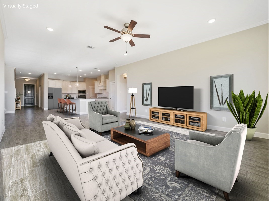 3308 Bentwood Ranch Drive Conroe, TX 77385 - Photo 5 of 24 a living room with furniture and a flat screen tv