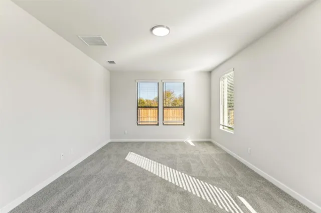 a view of a room with windows