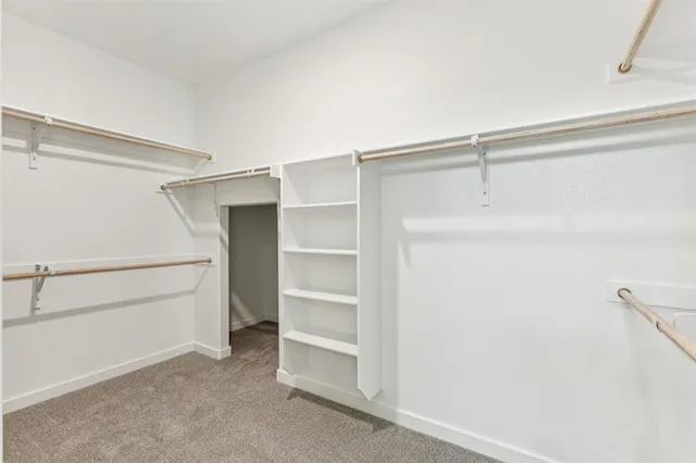 a view of an empty walk in closet