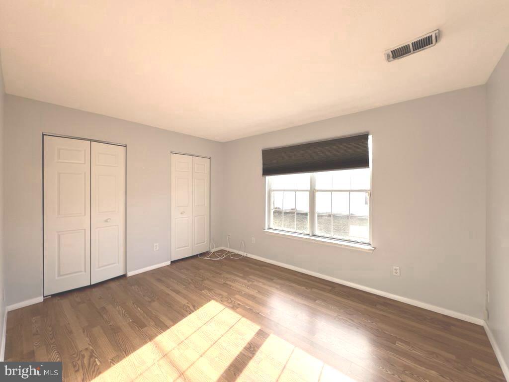 8220 Grainfield Road Severn, MD 21144 - Photo 16 of 23 a view of an empty room and window