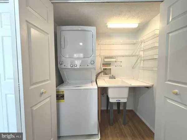 a bathroom with a sink a mirror and a toilet