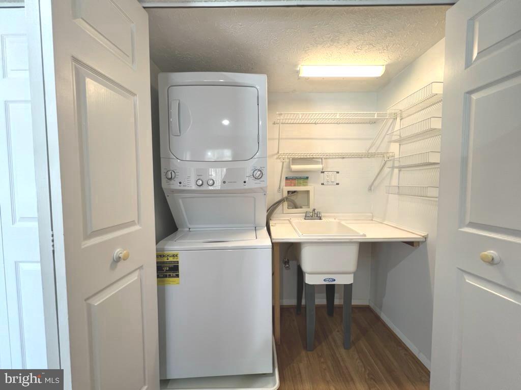 8220 Grainfield Road Severn, MD 21144 - Photo 18 of 23 a bathroom with a sink a mirror and a toilet