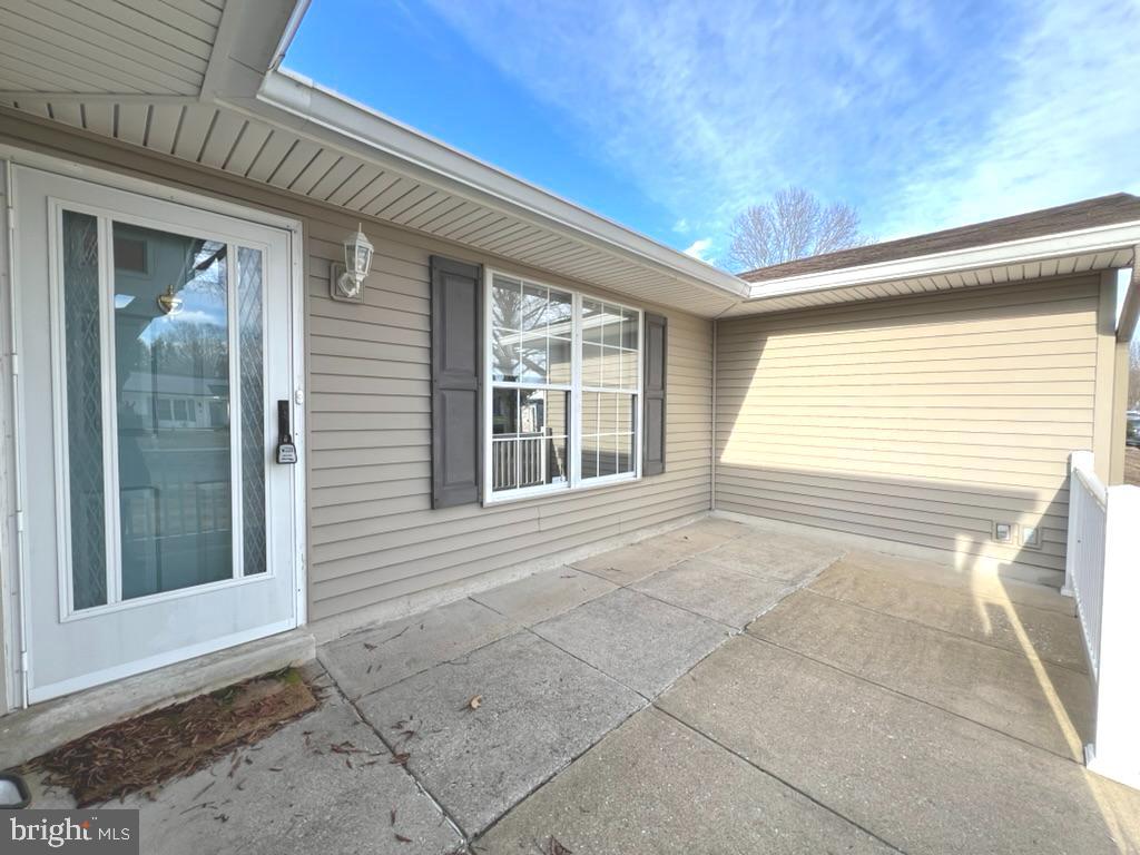 8220 Grainfield Road Severn, MD 21144 - Photo 2 of 23 a view of a house with a large window