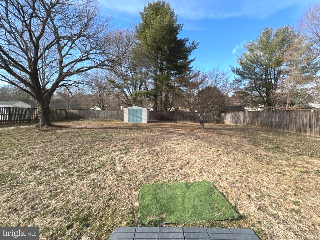 8220 Grainfield Road Severn, MD 21144 - Photo 23 of 23 a view of yard covered with snow
