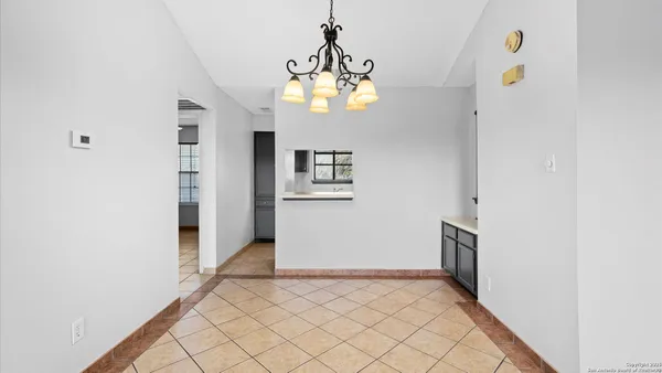 a view of an entryway with window