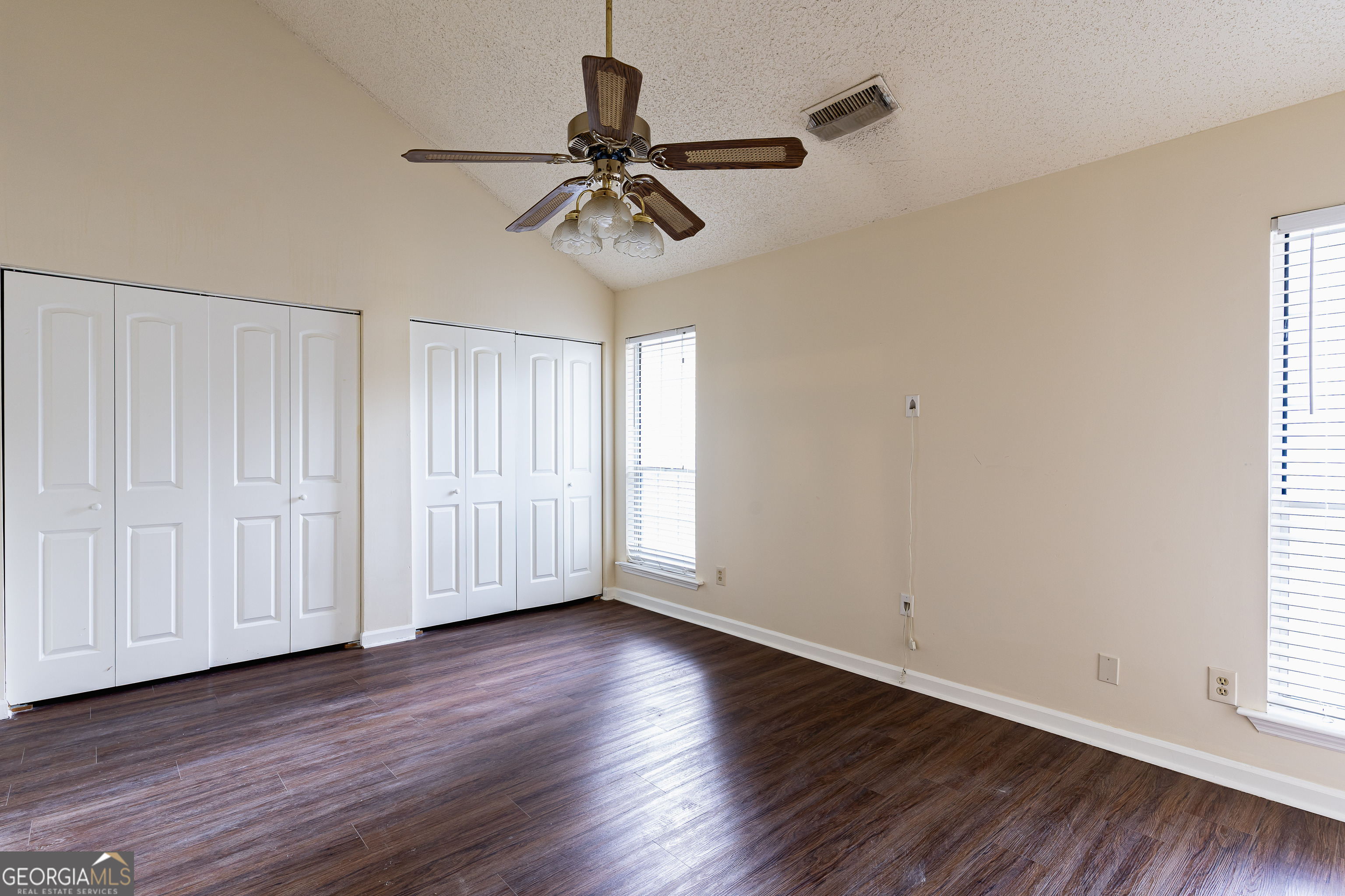 3821 Rex Mill Square Rex, GA 30273 - Photo 24 of 51 a view of empty room with wooden floor and fan
