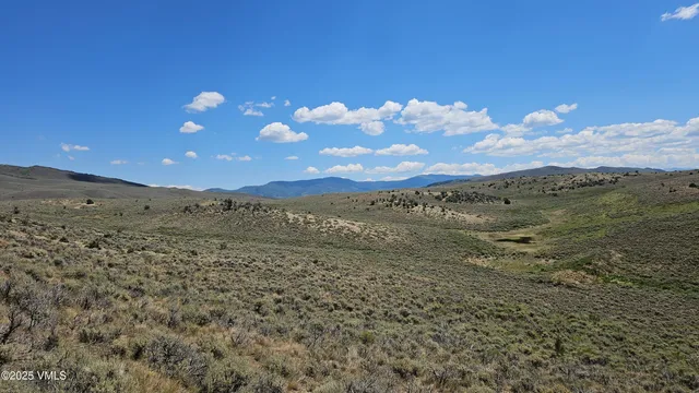 a view of an outdoor space with mountain view