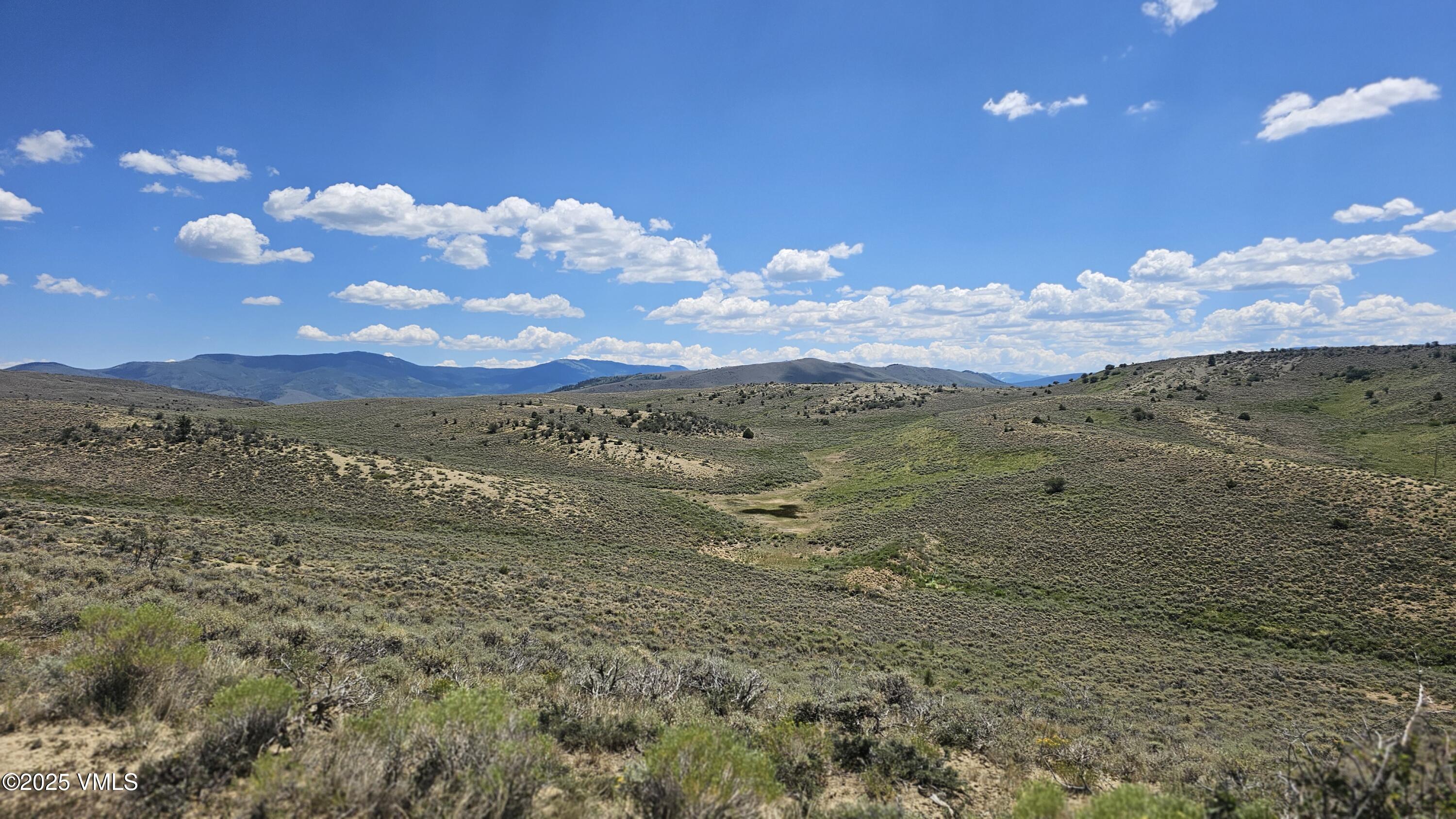 1 Horse Mountain Ranch Road Wolcott, CO 81655 - Photo 23 of 49 a view of a yard with an ocean beach