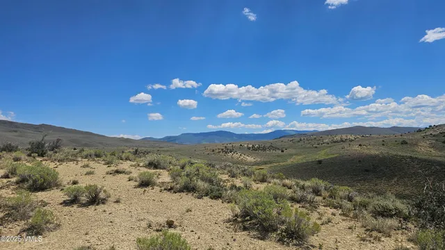 a view of lake with mountain