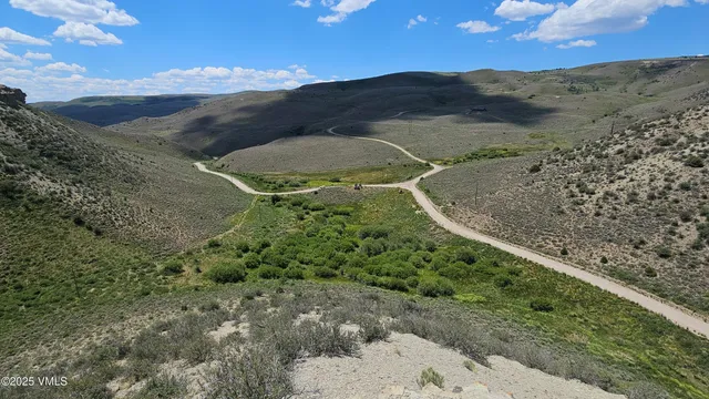 a view of a houses with a yard