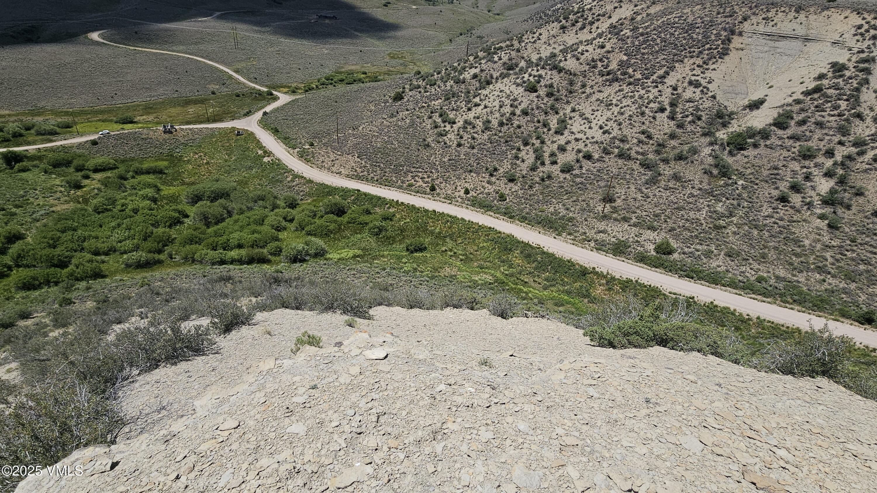 1 Horse Mountain Ranch Road Wolcott, CO 81655 - Photo 47 of 49 a view of a dry yard with wooden fence