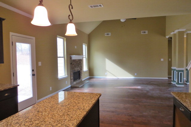 356 Walnut Grove Road Gray, GA 31032 - Photo 14 of 27 a view of a kitchen with granite countertop sink and a chandelier