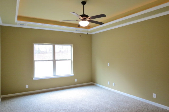 356 Walnut Grove Road Gray, GA 31032 - Photo 16 of 27 a view of a livingroom with a ceiling fan and window