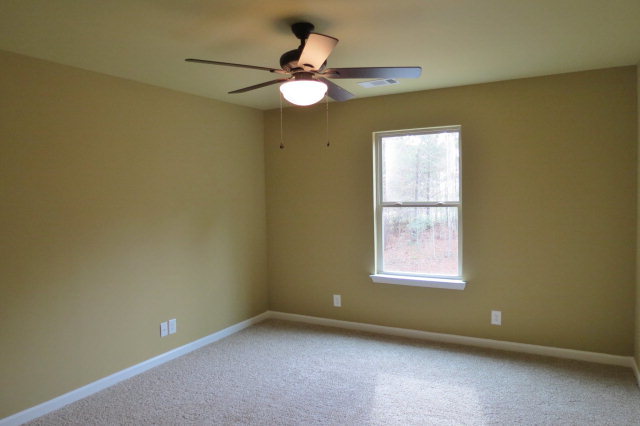 356 Walnut Grove Road Gray, GA 31032 - Photo 20 of 27 an empty room with a window