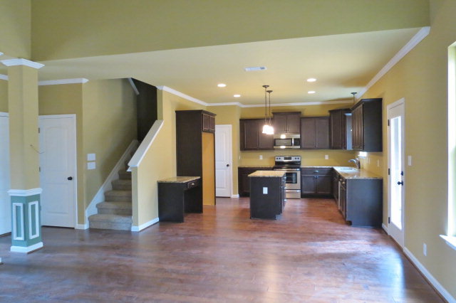 356 Walnut Grove Road Gray, GA 31032 - Photo 7 of 27 a view of open kitchen with stainless steel appliances refrigerator stove microwave and cabinets