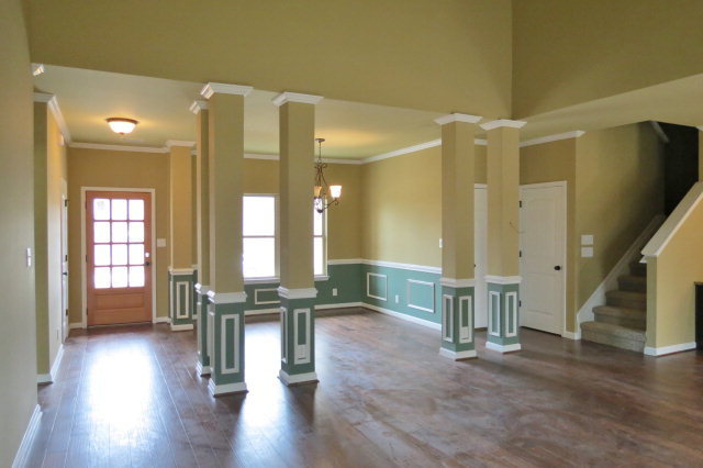 356 Walnut Grove Road Gray, GA 31032 - Photo 8 of 27 a view of a hallway with wooden floor and windows