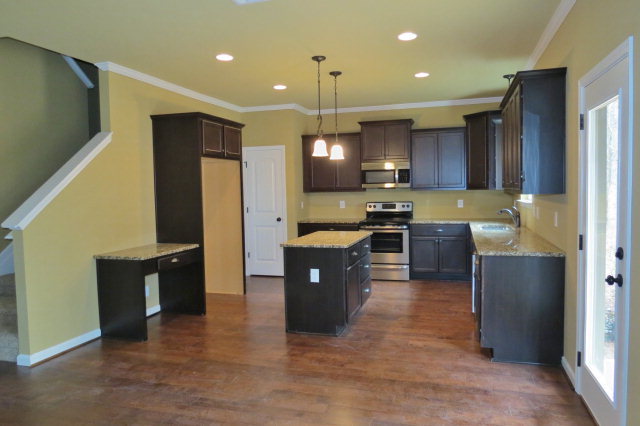 356 Walnut Grove Road Gray, GA 31032 - Photo 10 of 27 a large kitchen with stainless steel appliances granite countertop a refrigerator a sink a stove and oven