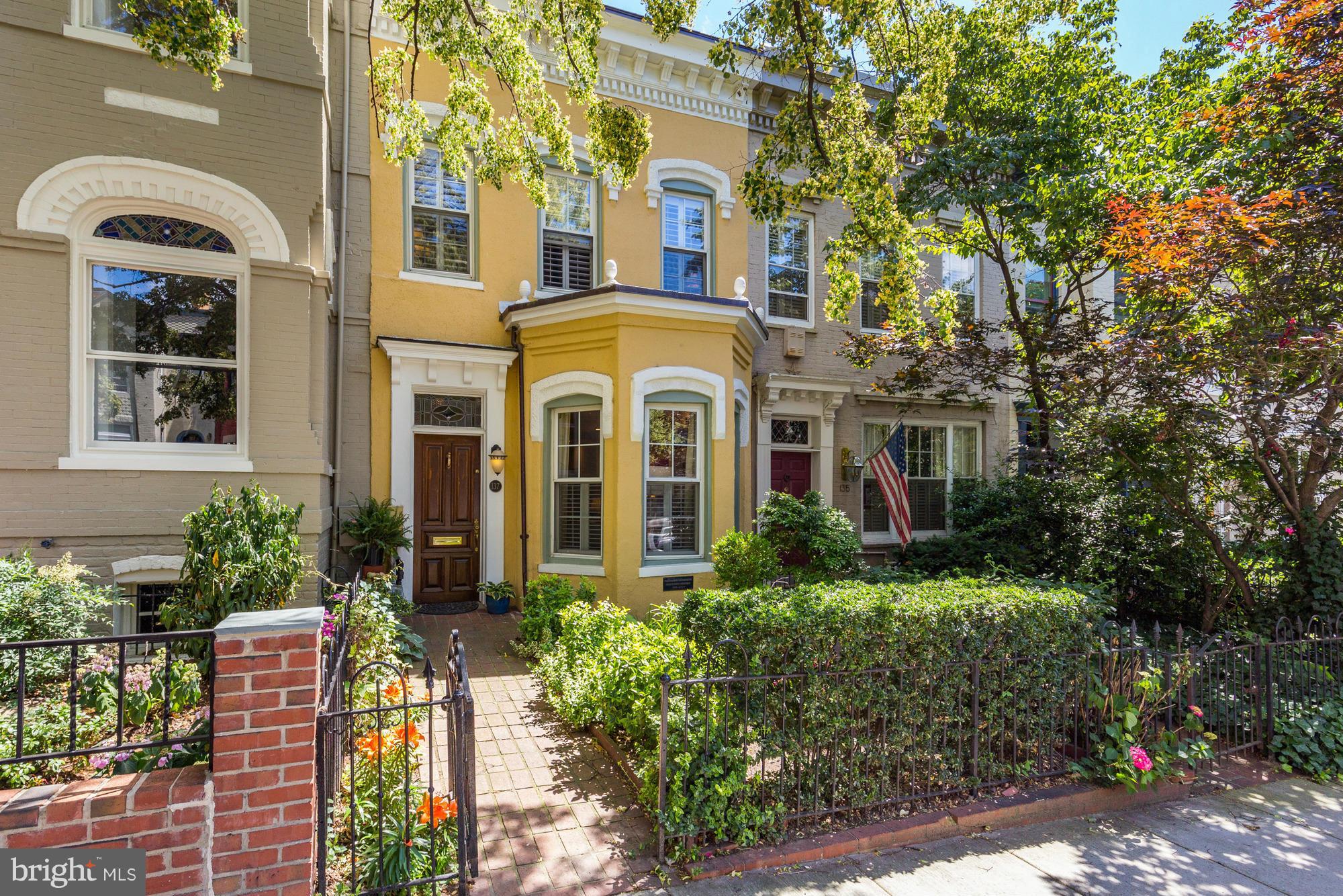 a front view of a multi story residential apartment buildings