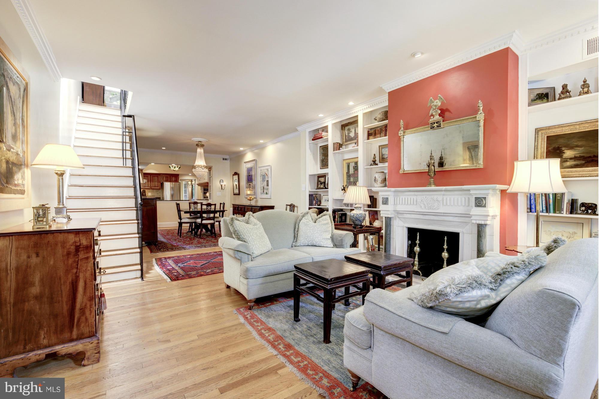 137 D Street Southeast Washington, DC 20003 - Photo 2 of 27 a living room with furniture and a fireplace