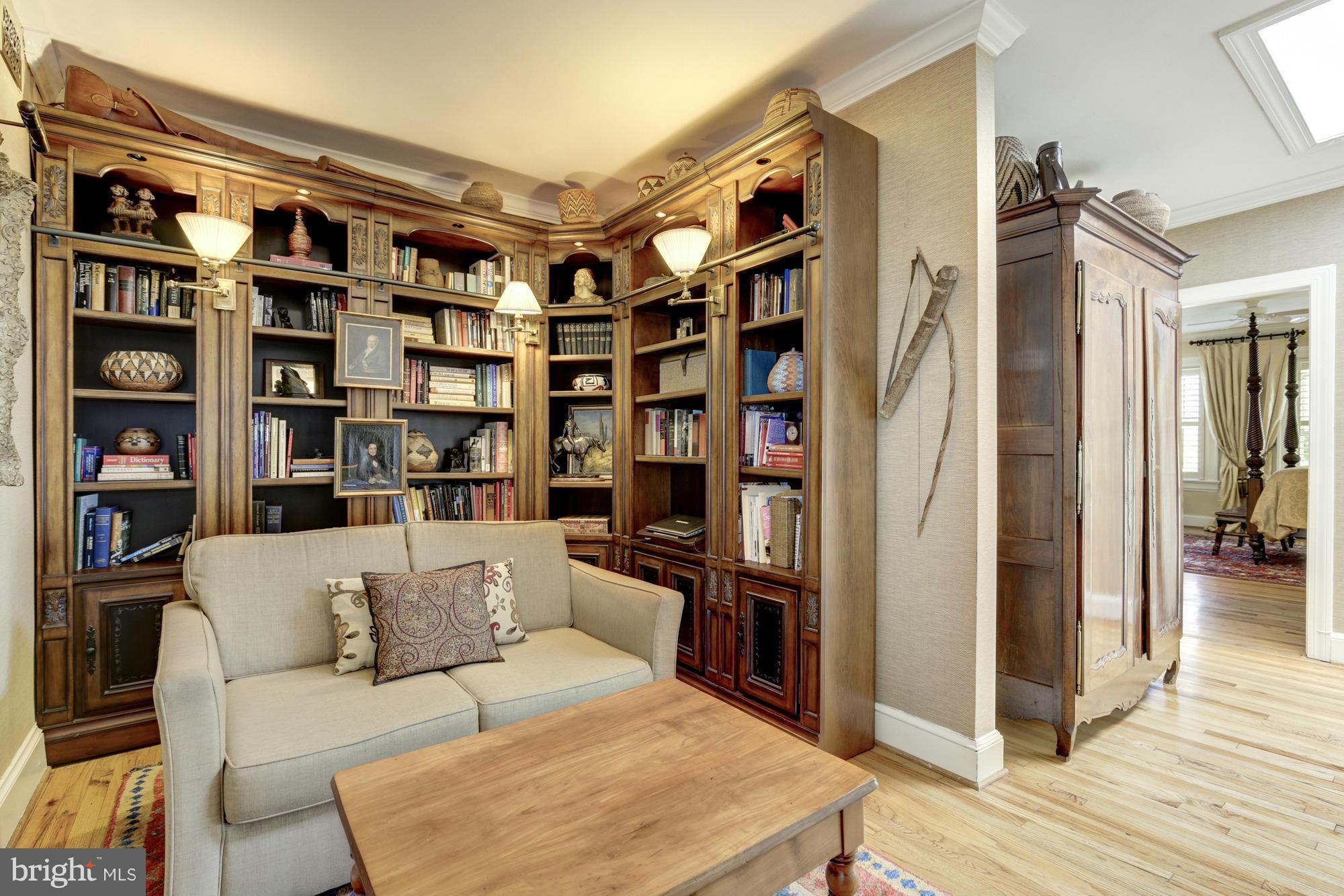 137 D Street Southeast Washington, DC 20003 - Photo 17 of 27 a living room with furniture a walk in closet and a large window