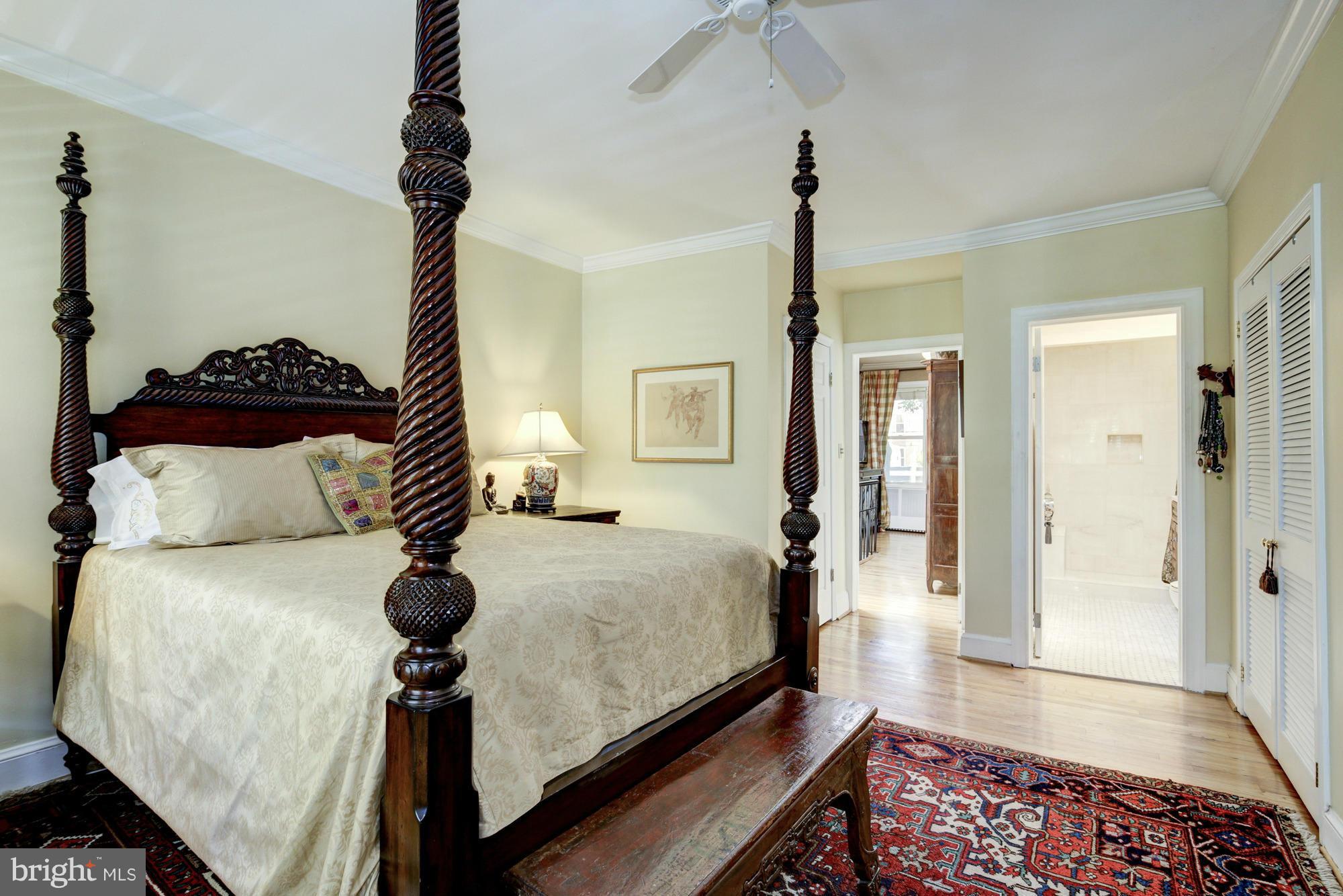 137 D Street Southeast Washington, DC 20003 - Photo 19 of 27 a bedroom with furniture and a wooden floor