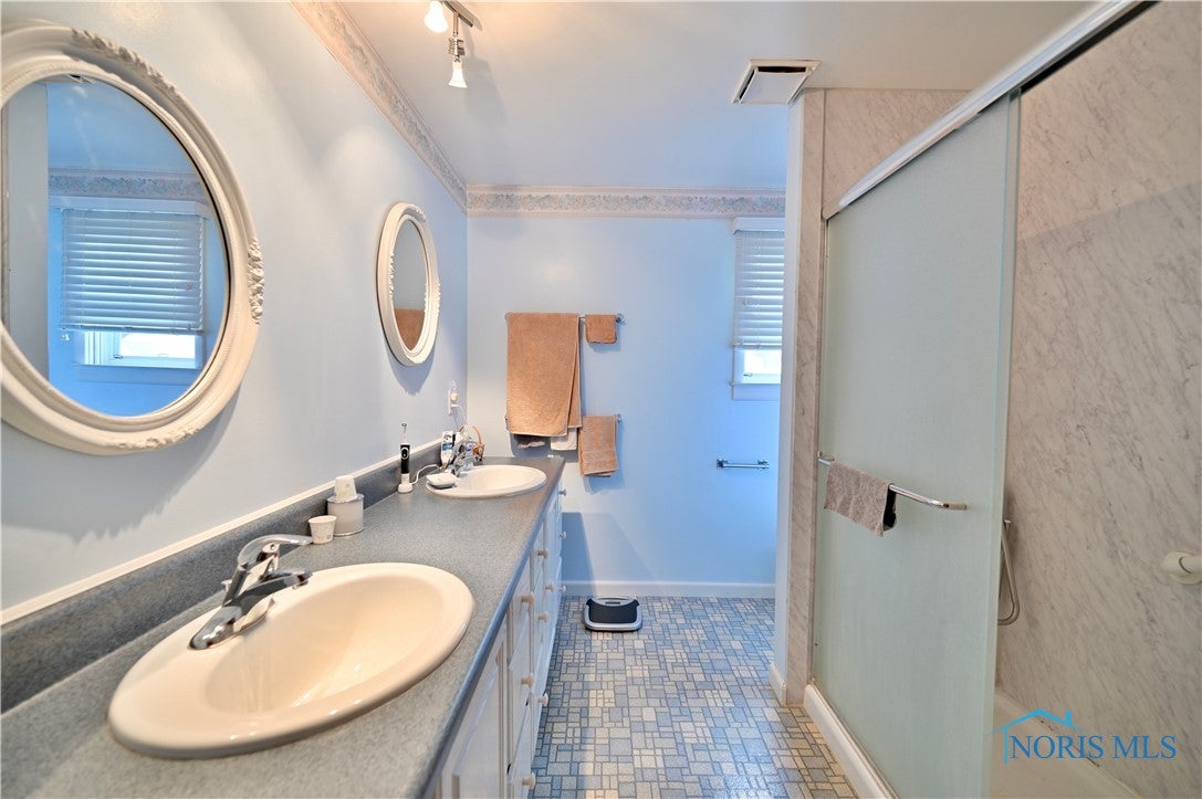 5547 Chippewa Road Toledo, OH 43613 - Photo 13 of 17 Upstairs Bathroom with dual sinks