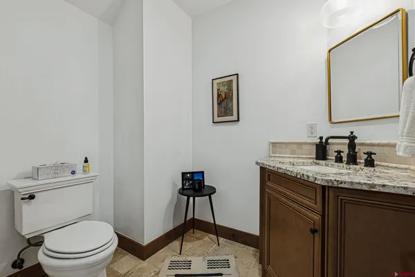a bathroom with a sink and a bath tub