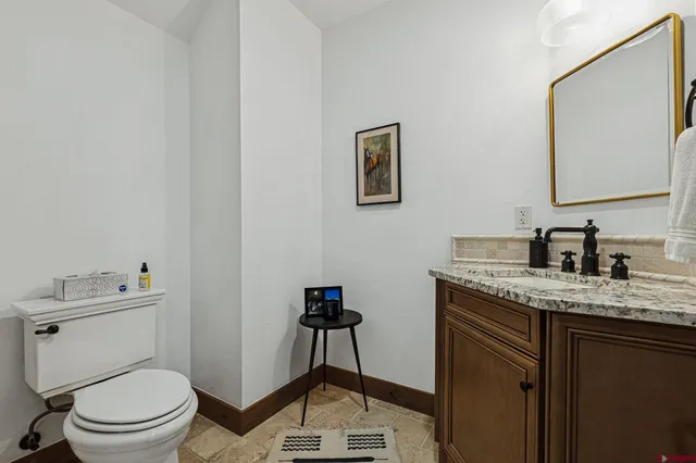 a bathroom with a sink and a bath tub