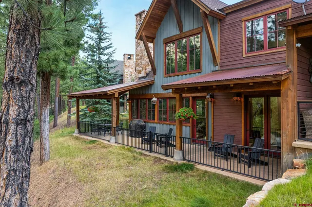 a view of a patio with wooden floor