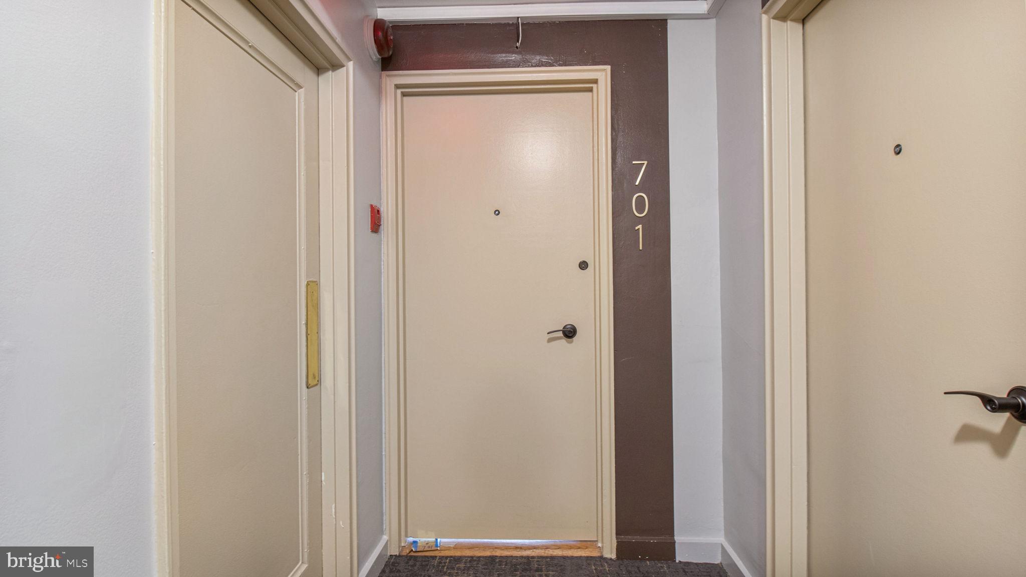 3901 Tunlaw Road Northwest, Unit 701 Washington, DC 20007 - Photo 13 of 17 a view of front door