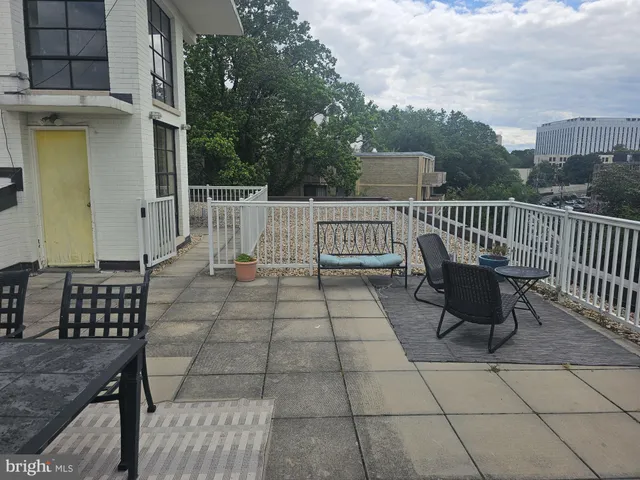 a view of a chairs and table on the terrace