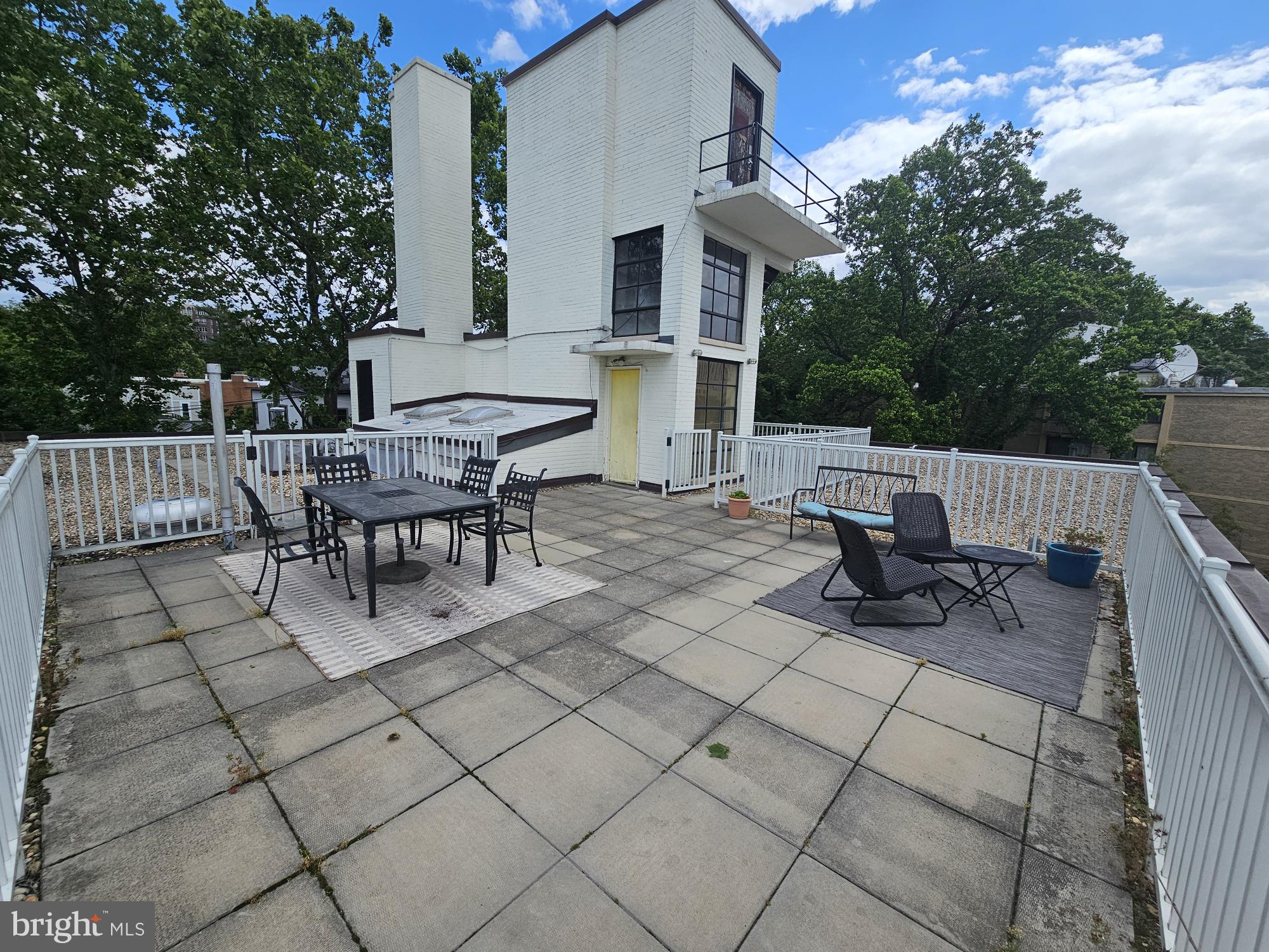 3901 Tunlaw Road Northwest, Unit 701 Washington, DC 20007 - Photo 16 of 17 a view of backyard with sitting area